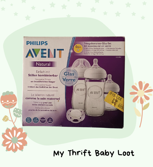 Preloved Philips Avent glass feeding bottles and a pacifier